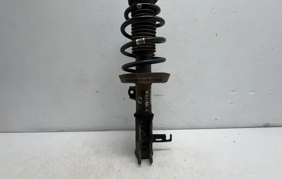 Opel Zafira C Front shock absorber with coil spring 13338924
