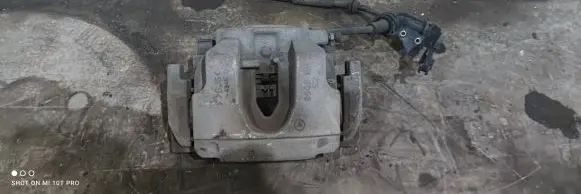 Mercedes-Benz GL X166 Front brake caliper 9906
