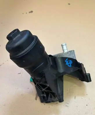 Skoda Octavia Mk3 (5E) Oil filter mounting bracket 03N115389H