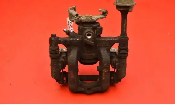 Opel Astra J Rear brake caliper 