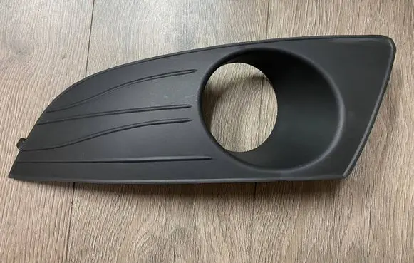 Dacia Logan I Front fog light trim/grill 8200838547