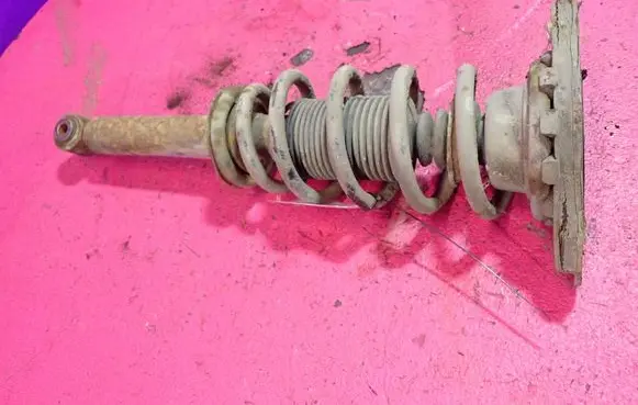 Nissan Primera Rear shock absorber with coil spring 