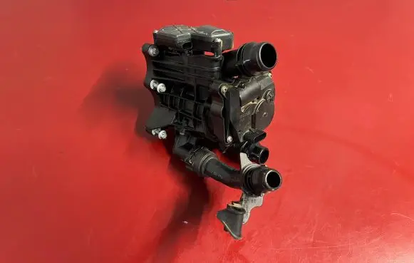 Thermostat/thermostat housing