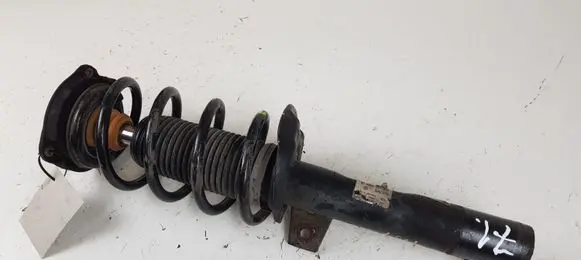 Volkswagen Scirocco Front shock absorber with coil spring 1T0413031JA