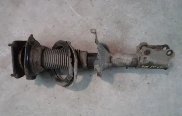 KIA Carnival Front shock absorber with coil spring