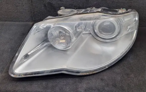 Volkswagen Touareg I Headlight/headlamp 7L6941031C