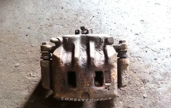 Subaru Forester SF Front brake caliper