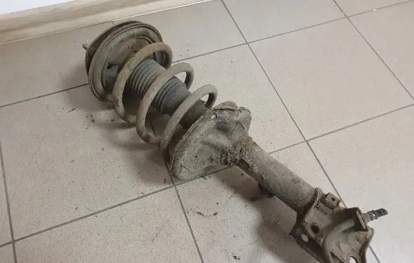 Hyundai Tucson JM Front shock absorber with coil spring