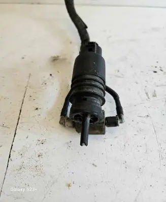 Volkswagen Golf IV Windscreen/windshield washer pump 1J0973722
