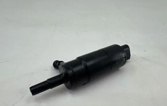 Volkswagen Touareg II Headlight washer pump 3B7955681