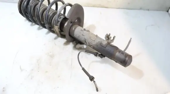Front shock absorber with coil spring