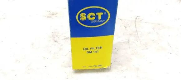Ford Escort Oil filter mounting bracket SM141