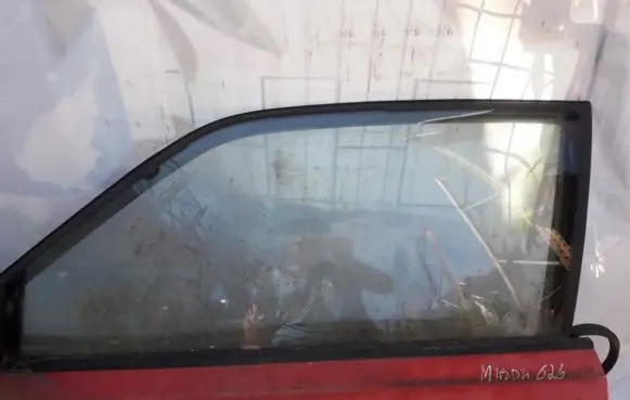 Mazda 626 Front door window glass four-door