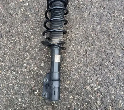 Ford Puma Front shock absorber with coil spring 