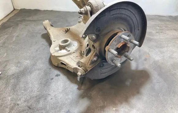 Rear wheel hub spindle/knuckle