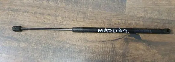 Mazda 2 Front bonnet/hood damper/strut D65163620