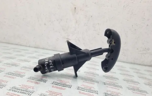 Headlight washer spray nozzle