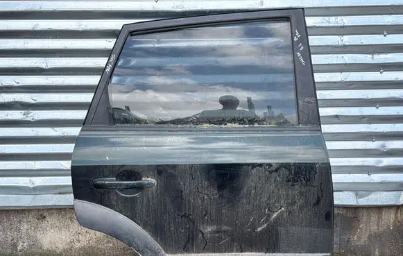 Hyundai Tucson JM Rear door