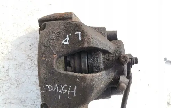 Opel Astra H Front brake caliper 