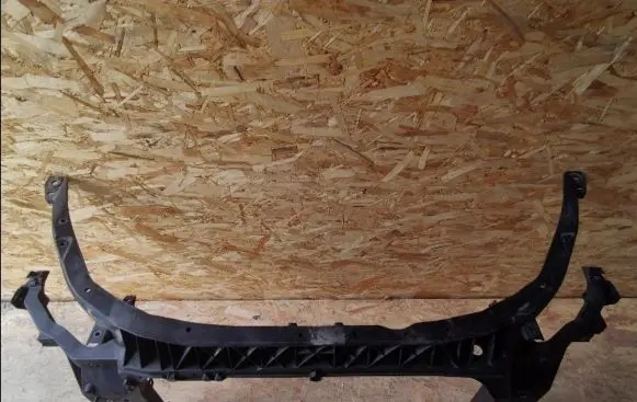 Radiator support slam panel