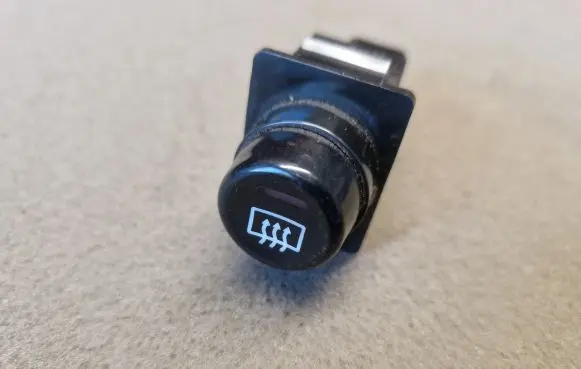Mitsubishi Pajero Sport I Windscreen/window heater switch