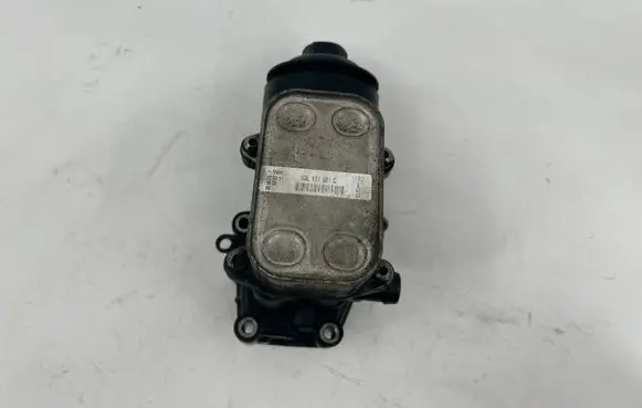 Volkswagen Golf VI Oil filter mounting bracket 03L117021C