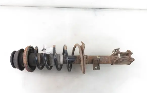 Suzuki Swift I Front shock absorber with coil spring 4160262J31