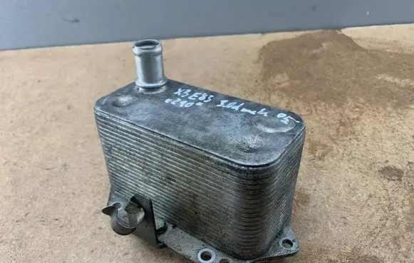 BMW X3 E83 Engine oil radiator 11427788462 7788462