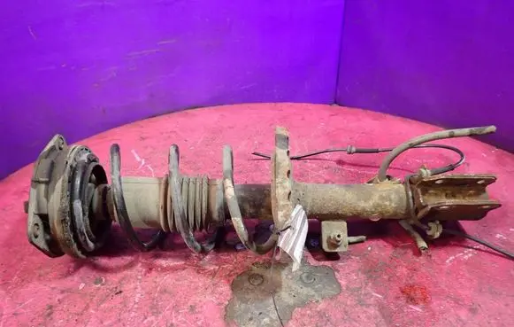Nissan Micra Front shock absorber with coil spring 