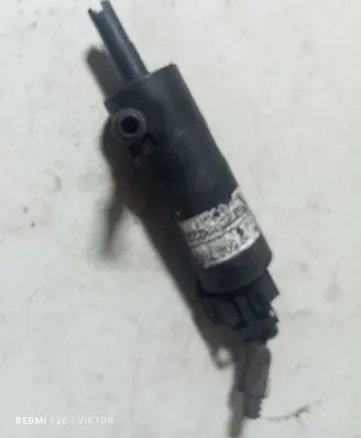 Opel Zafira B Headlight washer pump 90508709