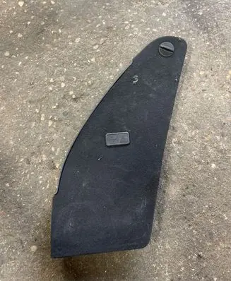 Trunk/boot lower side trim panel