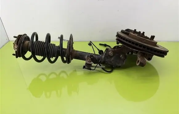 Front shock absorber with coil spring