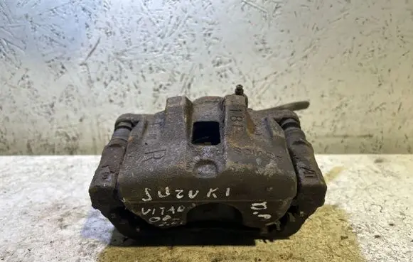 Suzuki Grand Vitara II Front brake caliper