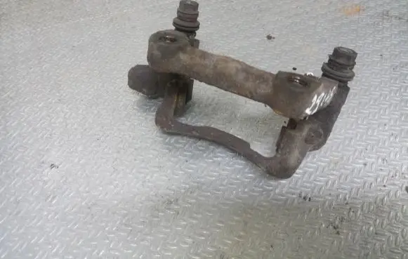 Volkswagen Caddy Brake caliper pad carrier rear 