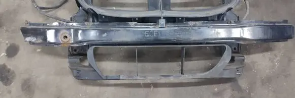 Radiator support slam panel