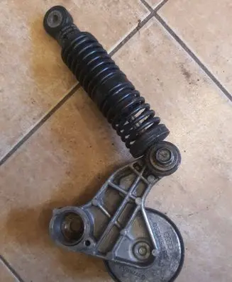 Generator/alternator belt tensioner