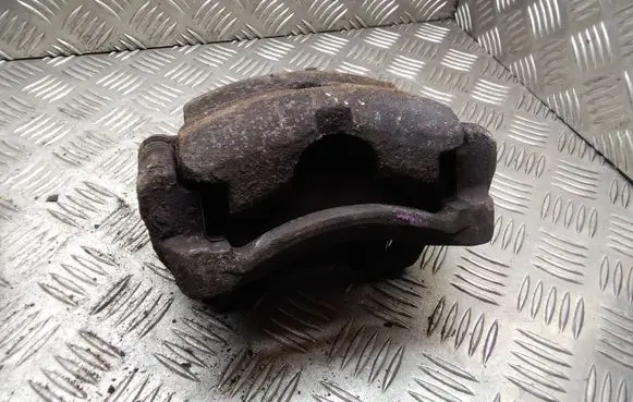 Nissan Almera N16 Front brake caliper