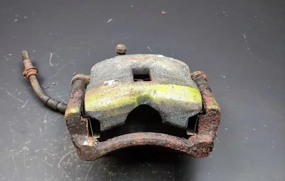 Nissan Primera Front brake caliper 25961