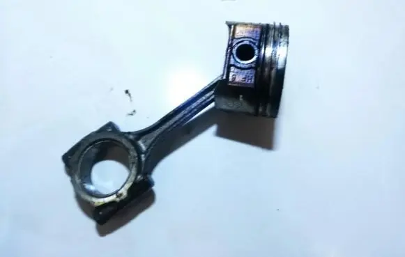 Piston with connecting rod