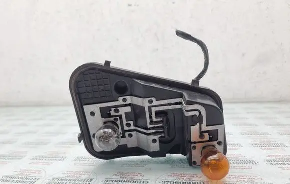 Volkswagen Touareg I Tail light bulb cover holder 7L6945257