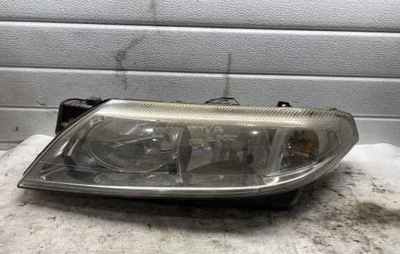 Renault Laguna II Headlight/headlamp 89004687