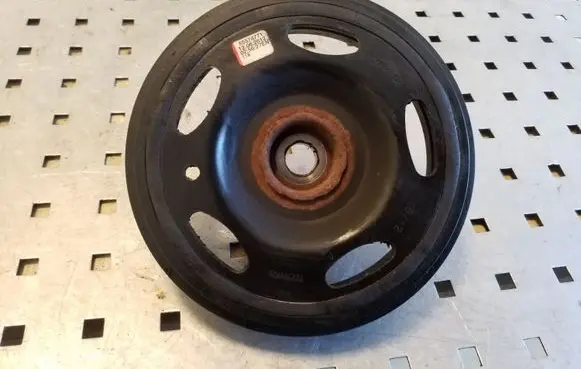 Opel Astra J Crankshaft pulley 55574771 722554909