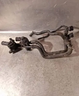 Volkswagen Golf VI Thermostat/thermostat housing 03C121121D