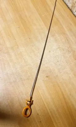 Oil level dip stick