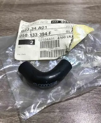 Volkswagen PASSAT B5 Engine coolant pipe/hose 058133394F