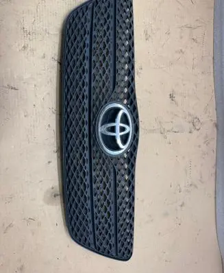 Toyota Corolla E120 E130 Bonnet/hood grill 1121222130