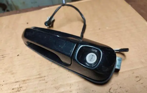 Jeep Grand Cherokee (WJ) Front door exterior handle 5GG26TRMAB