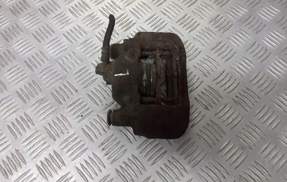 Mazda 323 Front brake caliper