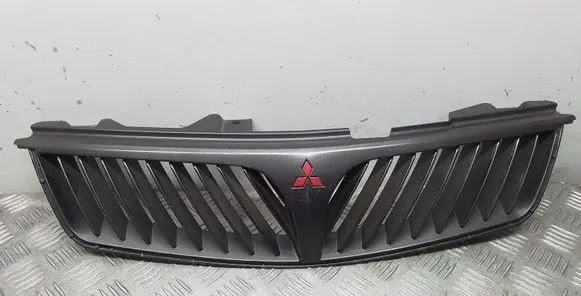 Mitsubishi Carisma Front bumper upper radiator grill XR245616