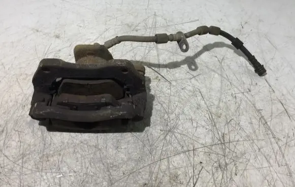 Ford Courier Front brake caliper